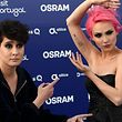 (FILES) In this file photo taken on May 06, 2018 Portuguese singers Claudia Pascoal (R) and Isaura pose for pictures during the Red Carpet ceremony of the 63rd edition of the Eurovision Song Contest 2018 at the Altice Arena in Lisbon.
Lisbon hopes hosting the Eurovision song contest will attract even more visitors despite complaints from locals that the city can not handle the huge influx of tourists already pouring in. / AFP PHOTO / Francisco LEONG / TO GO WITH AFP STORY "Lisbon in Eurovision tourism boost as locals sing the blues" by Daniel SILVA and Thomas CABRAL