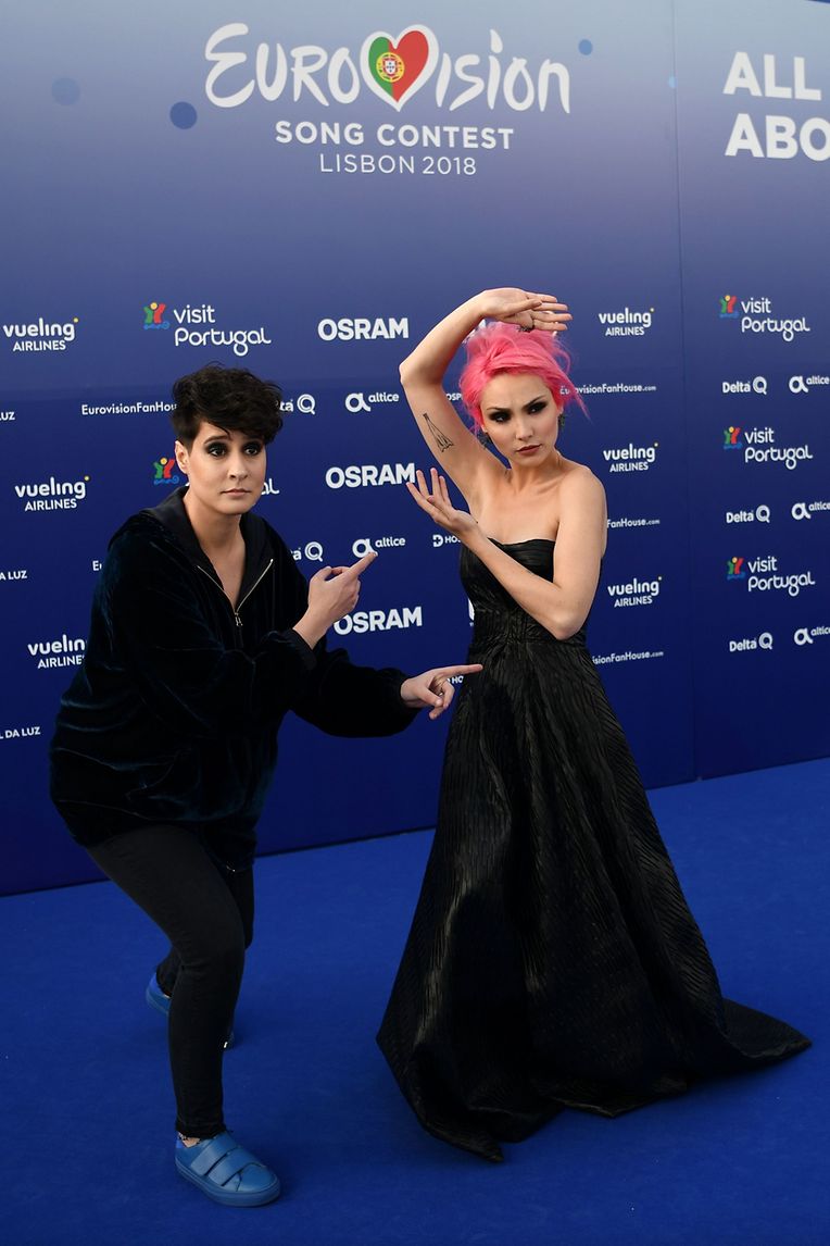 (FILES) In this file photo taken on May 06, 2018 Portuguese singers Claudia Pascoal (R) and Isaura pose for pictures during the Red Carpet ceremony of the 63rd edition of the Eurovision Song Contest 2018 at the Altice Arena in Lisbon.
Lisbon hopes hosting the Eurovision song contest will attract even more visitors despite complaints from locals that the city can not handle the huge influx of tourists already pouring in. / AFP PHOTO / Francisco LEONG / TO GO WITH AFP STORY "Lisbon in Eurovision tourism boost as locals sing the blues" by Daniel SILVA and Thomas CABRAL