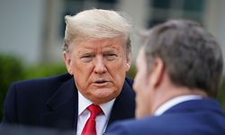 US President Donald Trump (L) speaks with anchor Bill Hemmer during a Fox News virtual town hall meeting from the Rose Garden of the White House in Washington, DC, on March 24, 2020. (Photo by MANDEL NGAN / AFP)