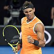 Spain's Rafael Nadal celebrates his victory against Frances Tiafoe of the US during their men's singles quarter-final match on day nine of the Australian Open tennis tournament in Melbourne on January 22, 2019. (Photo by William WEST / AFP) / -- IMAGE RESTRICTED TO EDITORIAL USE - STRICTLY NO COMMERCIAL USE --