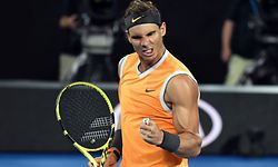 Spain's Rafael Nadal celebrates his victory against Frances Tiafoe of the US during their men's singles quarter-final match on day nine of the Australian Open tennis tournament in Melbourne on January 22, 2019. (Photo by William WEST / AFP) / -- IMAGE RESTRICTED TO EDITORIAL USE - STRICTLY NO COMMERCIAL USE --
