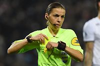 (FILES) In this file photo taken on February 12, 2022, French Referee Stephanie Frappart reacts during the French L1 football match Montpellier vs Lille at the Mosson stadium in Montpellier, Southern France. (Photo by Sylvain THOMAS / AFP)