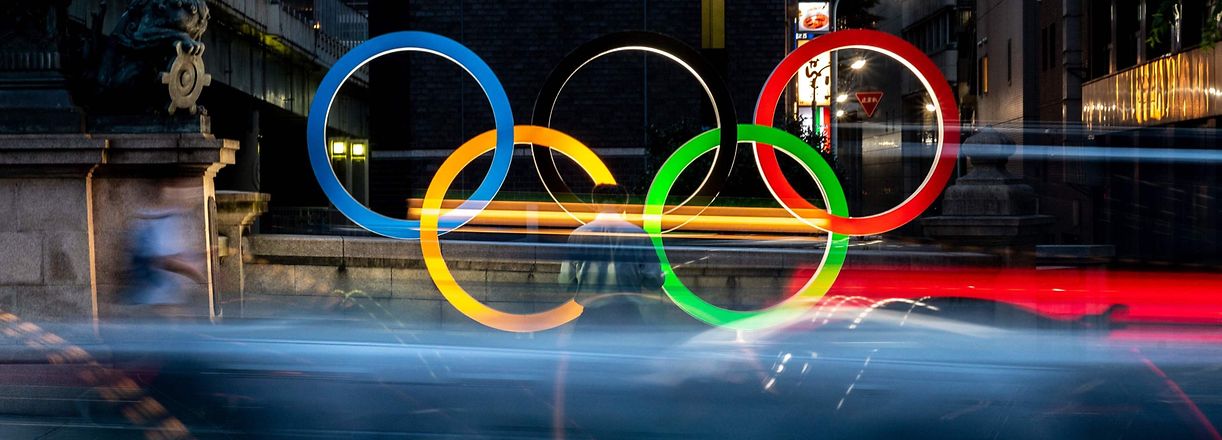 The Olympic Rings are displayed in Tokyo's Nihonbashi district on July 10, 2021. (Photo by Philip FONG / AFP)