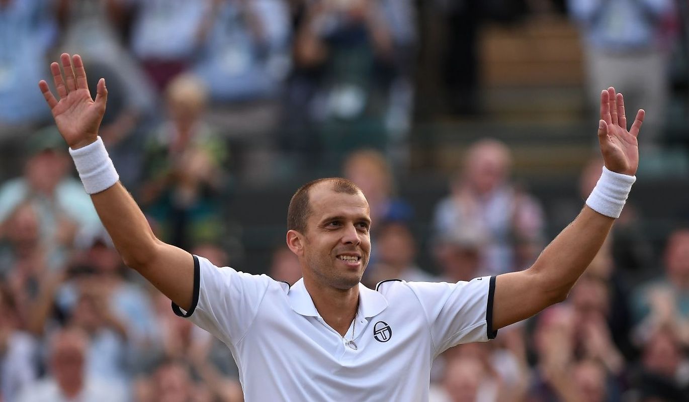 Luxembourg's Gilles Muller reacts after winning against Spain's Rafael Nadal during their men's singles fourth round match on the seventh day of the 2017 Wimbledon Championships at The All England Lawn Tennis Club in Wimbledon, southwest London, on July 10, 2017.
Muller won the match 6-3, 6-4, 3-6, 4-6, 15-13. / AFP PHOTO / Glyn KIRK / RESTRICTED TO EDITORIAL USE