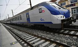 (FILES) This file photo taken on April 3, 2018 in Saint-Charles railway station in Marseille southern France shows a TER (Transport express regional) train at the start of three months of rolling rail strikes. - Staff at French state rail operator SNCF's regional network walked off the job on October 18, 2019 following an accident in Champagne-Ardenne region as a regional TER (Transport express regional) train struck a lorry, injuring three. (Photo by BERTRAND LANGLOIS / AFP)