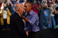 PHILADELPHIA, PA - NOVEMBER 05: President Joe Biden (L) and former U.S. President Barack Obama (R) embrace on stage during a rally for Pennsylvania Democratic Senate nominee John Fetterman and Democratic gubernatorial nominee Josh Shapiro at the Liacouras Center on November 5, 2022 in Philadelphia, Pennsylvania. Fetterman will face Republican nominee Dr. Mehmet Oz as Shapiro faces Republican Doug Mastriano on November 8 in the midterm general election.   Mark Makela/Getty Images/AFP