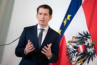 Austrian Chancellor Sebastian Kurz addresses a press conference on "Current information about the Corona aid package for workplaces and companies" in Vienna, Austria, on March 26, 2020. (Photo by GEORG HOCHMUTH / APA / AFP) / Austria OUT