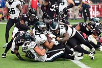 GLENDALE, ARIZONA - OCTOBER 09: Jalen Hurts #1 of the Philadelphia Eagles scores a touchdown during the first quarter against the Arizona Cardinals at State Farm Stadium on October 09, 2022 in Glendale, Arizona. (Photo by Norm Hall/Getty Images)
