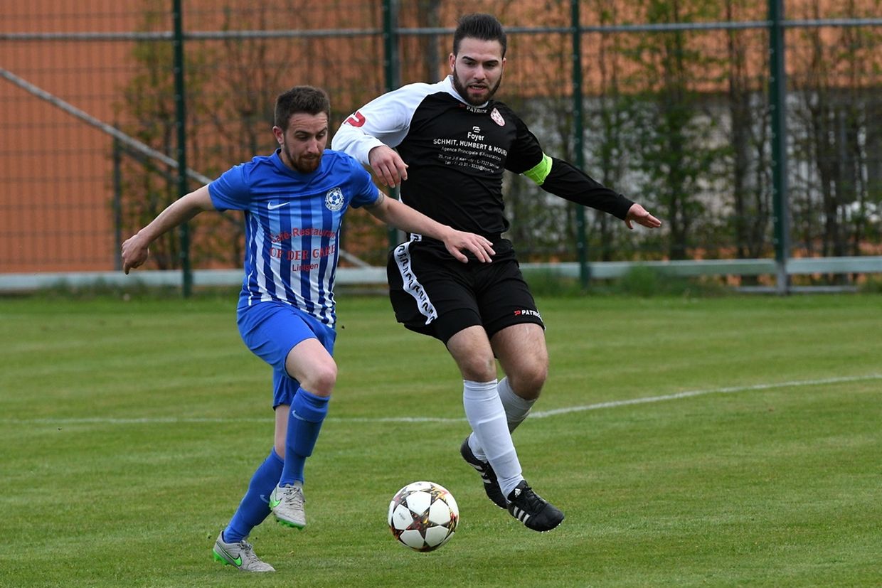 Roberto Barella tente d'échapper au marquage de Jean-Charles Banas.
