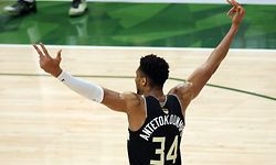 MILWAUKEE, WISCONSIN - JULY 20: Giannis Antetokounmpo #34 of the Milwaukee Bucks celebrates in the final seconds before defeating the Phoenix Suns in Game Six to win the 2021 NBA Finals at Fiserv Forum on July 20, 2021 in Milwaukee, Wisconsin. NOTE TO USER: User expressly acknowledges and agrees that, by downloading and or using this photograph, User is consenting to the terms and conditions of the Getty Images License Agreement.   Jonathan Daniel/Getty Images/AFP
== FOR NEWSPAPERS, INTERNET, TELCOS & TELEVISION USE ONLY ==