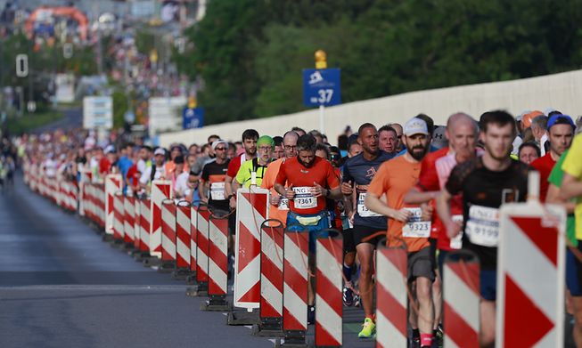 More than 13,000 runners participated in the marathon on Saturday evening