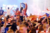 Croatia's fans celebrate victory against Russia in the Croatian capital Zagreb's main square after the 2018 FIFA World Cup Russia Round of 8 match between Russia and Croatia on July 7, 2018.  / AFP PHOTO / Denis Lovrovic