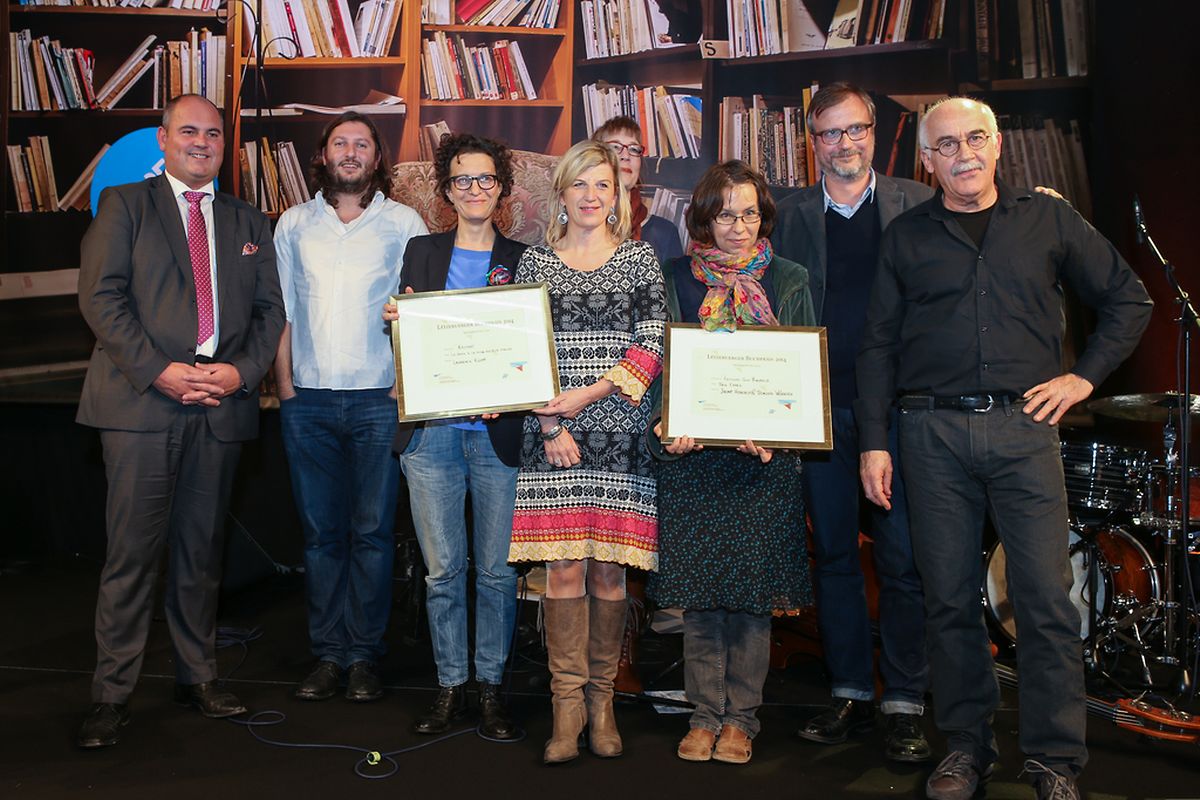 Letzebuerger Buchprais - Prix spéciaux du jury pour la conception, les illustrations et le graphisme attribués à  «La Dame à la mise en plis mauve» de Laurence Kloppet, et à Jhemp Hoscheit et Dorota Wunsch pour «Den Eppes»