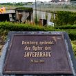 DUISBURG, GERMANY - SEPTEMBER 01:  A general view of the makeshift memorial to victims of the Love Parade disaster on its fifth anniversary on September 1, 2015 in Duisburg, Germany. In today's case a fireman who claims he suffered post-traumatic stress from his participation in emergency crew efforts at the Love Parade tragedy is suing the Love Parade organizer, Lopavent GmbH, for EUR 90,000. At least four other suits are to follow in November. 21 people were killed when a tunnel leading to the 2010 Love Parade techno-party in Duisburg became blocked due to overcrowding.  (Photo by Sascha Schuermann/Getty Images)