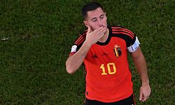 (FILES) In this file photo taken on November 27, 2022 Belgium's forward #10 Eden Hazard blows kisses to supporters during the Qatar 2022 World Cup Group F football match between Belgium and Morocco at the Al-Thumama Stadium in Doha. - Belgium star Eden Hazard, 31, announced on social media his retirement from international football on December 7, 2022, days after the team crashed out of the World Cup in the group stage. (Photo by Kirill KUDRYAVTSEV / AFP)