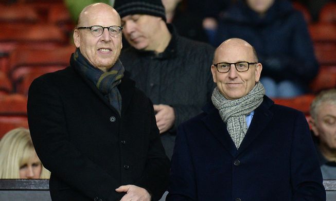 Manchester United's co-chairmen Joel Glazer (right) and Avram Glazer (left) are considering selling the club