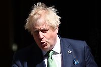 Britain's Prime Minister Boris Johnson leaves 10 Downing Street in London on May 18, 2022 to take part in the weekly session of Prime Minister's Questions (PMQs) at the House of Commons. (Photo by Adrian DENNIS / AFP)