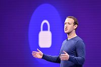 (FILES) In this file photo taken on May 1, 2018 Facebook CEO Mark Zuckerberg speaks during the annual F8 summit at the San Jose McEnery Convention Center in San Jose, California. - Facebook is leaping into the world of cryptocurrency with its own digital money, designed to let people save, send or spend money as easily as firing off text messages."Libra" -- described as "a new global currency" -- was unveiled June 18, 2019 in a new initiative in payments for the world's biggest social network with the potential to bring crypto-money out of the shadows and into the mainstream. Facebook and an array of partners released a prototype of Libra as an open source code to be used by developers interested in weaving it into apps, services or businesses ahead of a rollout as global digital money next year. (Photo by JOSH EDELSON / AFP)