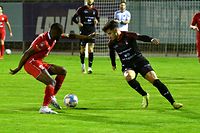 Nego Ekofo, rouge, Swift Hesperange, and Gonçalo Almeida, FC Differdange 03. Football: Swift Hesperange – FC Differdange 03, BGL Ligue.  Stade Alphonse Theis, Hesperange.  Photo: Stéphane Guillaume