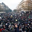 TOPSHOT - People take part in a demonstration on December 10, 2019 in Paris as part of the sixth day of massive strike action over government's plans to overhaul the pension system. - Unions have vowed to keep up the fight over the reforms, which are set to be finalised and published on December 11. Another mass demonstration is planned in Paris and other cities today, with teachers and other workers once again expected to walk out alongside transport workers. (Photo by Zakaria ABDELKAFI / AFP)