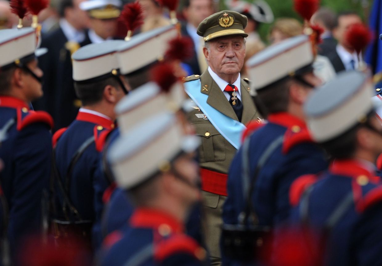 (FILES) In this file photo taken on October 12, 2008 King Juan Carlos of Spain takes part in the celebrations of Spain's national day in Madrid. - Spain's former king Juan Carlos, at the centre of an alleged $100-million corruption scandal, has reportedly fled to the Dominican Republic after his shock announcement he was going into exile. Daily newspaper ABC reported on August 4, 2020 that he left Spain and flew to the Dominican Republic via Portugal. (Photo by Pierre-Philippe MARCOU / AFP)