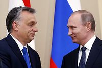 Russian President Vladimir Putin (R) and Hungarian Prime Minister Viktor Orban attend a joint press conference following their meeting at the Novo-Ogaryovo state residence outside Moscow, on February 17, 2016. AFP PHOTO / POOL / MAXIM SHIPENKOV
