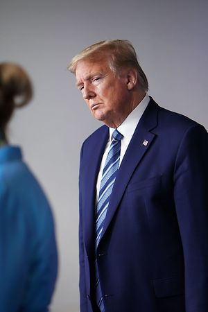 US President Donald Trump listens while Response coordinator for White House Coronavirus Task Force Deborah Birx speaks during the daily briefing on the novel coronavirus, which causes COVID-19, in the Brady Briefing Room of the White House in Washington, DC on April 21, 2020. (Photo by MANDEL NGAN / AFP)