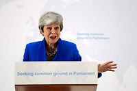 Britain's Prime Minister Theresa May delivers a speech in central London on May 21, 2019. - British Prime Minister Theresa May on Tuesday outlined a series of incentives for MPs to support her Brexit deal, saying there was "one last chance" to end the deadlock. May called the draft legislation going before MPs next month a "new Brexit deal" to end the current political impasse which has delayed Brexit. (Photo by Kirsty Wigglesworth / POOL / AFP)