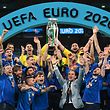 Italy's defender Giorgio Chiellini raises the European Championship trophy during the presentation after Italy won the UEFA EURO 2020 final football match between Italy and England at the Wembley Stadium in London on July 11, 2021. (Photo by Michael Regan / POOL / AFP)