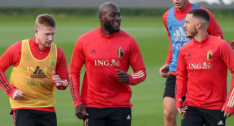 (FromL) Belgium's midfielder Kevin De Bruyne, Belgium's forward Romelu Lukaku and Belgium's forward Eden Hazard warm up during a training session in Tubize on October 5, 2021 in preparations of their UEFA Nations League semifinal football match against France. (Photo by VIRGINIE LEFOUR / Belga / AFP) / Belgium OUT