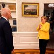 US President Joe Biden welcomes German Chancellor Angela Merkel to the Oval Office of the White House on Thursday. 