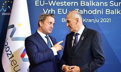 Slovenia's Prime Minister Janez Jansa (R) welcomes Luxembourg's Prime Minister Xavier Bettel for the EU-Western Balkans summit at Brdo Congress Centre, near Ljubljana on October 6, 2021. - Western Balkan countries can expect reassurances but no concrete progress on their stalled bids for European Union membership when EU leaders meet today. (Photo by Jure Makovec / AFP)