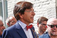 Mons Mayor Elio Di Rupo (L) and French actor Michel Blanc (R) walk during the Ducasse - Doudou folkloric festival in Mons, on June 11, 2017. 
The Doudou festival was recognised in 2005 by the UNESCO as one of the masterpieces of the Oral and Intangible Heritage of Humanity.  / AFP PHOTO / BELGA AND Belga / BRUNO FAHY / Belgium OUT