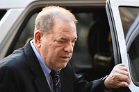 (FILES) In this file photo taken on January 24, 2020 Harvey Weinstein arrives at the Manhattan Criminal Court, for his rape and sexual assault trial in New York City. - One of Harvey Weinstein's main accusers told his rape trial on January 27,2020 that the ex-Hollywood producer forcibly performed oral sex on her in a children's bedroom in his New York home.  Mimi Haleyi -- a former production assistant -- cried as she told the Manhattan court that Weinstein, 67, sexually assaulted her in July 2006 while she was on her period.She described how Weinstein, who was then three times her weight, initially appeared "friendly" before he backed her into a bedroom with children's drawings on the wall. (Photo by Johannes EISELE / AFP)