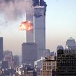 (FILES) In this file photo taken on September 10, 2001, a hijacked commercial plane crashes into the World Trade Center in New York. - The remains of two more victims of 9/11 have been identified, thanks to advanced DNA technology, New York officials announced on September 8, 2021, just days before the 20th anniversary of the attacks. The office of the city's chief medical examiner said it had formally identified the 1,646th and 1,647th victim of the al-Qaeda attacks on New York's Twin Towers which killed 2,753 people. They are the first identifications of victims from the collapse of the World Trade Center since October 2019. (Photo by SETH MCALLISTER / AFP)