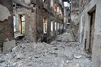 A visão de uma escola destruída como resultado de uma luta não muito longe do centro da cidade ucraniana de Kharkiv, localizada a cerca de 50 km da fronteira ucraniana-russa, a 28 de fevereiro de 2022.