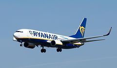(FILES) In this file photo taken on September 28, 2018 a Ryanair Boeing 737-800 aircraft lands at Barcelona's 'El Prat' airport. - Ryanair on January 18, 2019 cut its annual profits forecast for a second time, blaming the move on lower airfares caused by overcapacity in the European short-haul sector. (Photo by PAU BARRENA / AFP)