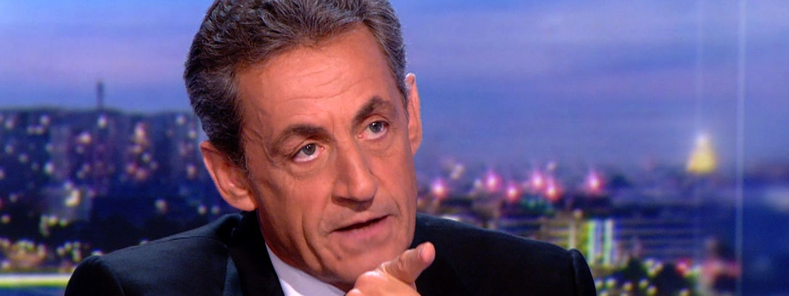 This video grab taken from footage released by French television channel TF1 shows French former president Nicolas Sarkozy speaking during an interview on March 22, 2018 at the TF1 headquarters in Boulogne-Billancourt, a day after he was charged on corruption over allegations that late Libyan dictator funded his 2007 presidential election campaign, one of France's most explosive political scandals in years. / AFP PHOTO / TF1 / Handout
