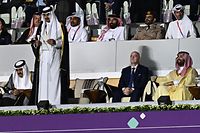 Qatar's Emir Sheikh Tamim bin Hamad al-Thani (2ndL) delivers a speech next to Qatar's former Emir Sheikh Hamad bin Khalifa al-Thani (L), FIFA President Gianni Infantino (2ndR) and Saudi Arabia's Crown Prince Mohammed bin Salman al-Saud during the opening ceremony ahead of the Qatar 2022 World Cup Group A football match between Qatar and Ecuador at the Al-Bayt Stadium in Al Khor, north of Doha on November 20, 2022. (Photo by MANAN VATSYAYANA / AFP)