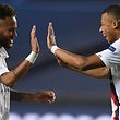 Paris Saint-Germain's Brazilian forward Neymar (L) and Paris Saint-Germain's French forward Kylian Mbappe celebrate after winning  at the end of the UEFA Champions League quarter-final football match between Atalanta and Paris Saint-Germain at the Luz Stadium in Lisbon on August 12, 2020. (Photo by David Ramos / POOL / AFP)
