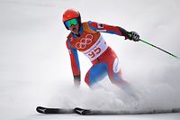 Luxembourg's Matthieu Osch reacts after competing in the Men's Giant Slalom at the Jeongseon Alpine Center during the Pyeongchang 2018 Winter Olympic Games in Pyeongchang on February 18, 2018. / AFP PHOTO / Martin BERNETTI