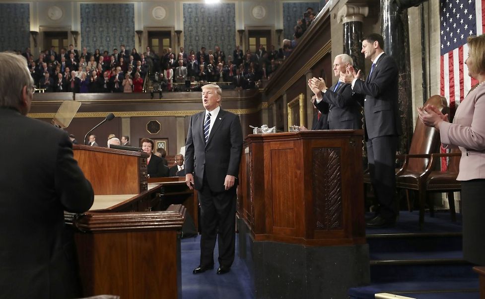 U.S. President Donald Trump is applauded after delivering  his first address to a joint session of Congress from the floor of the House of Representatives iin Washington, U.S., February 28, 2017