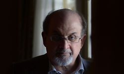 In this file photo taken on April 19, 2013, British author Salman Rushdie, poses for a portrait during 'Midnight's Children' press day on April 19, 2013 in Los Angeles, California. - It has been reported that Rushdie was attacked on stage today during an event in New York. (Photo by Joe KLAMAR / AFP)