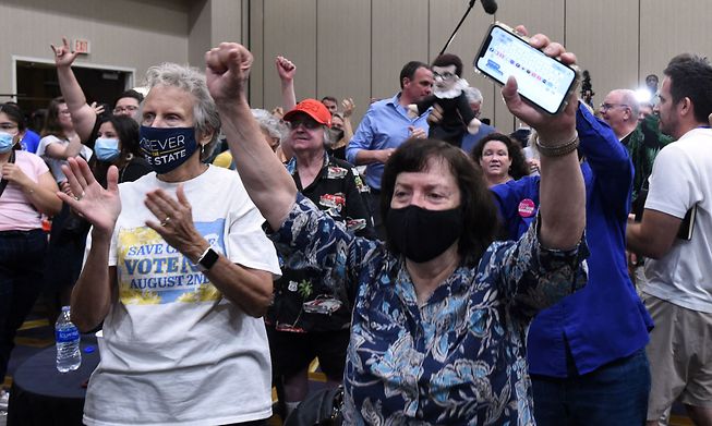 Pro-choice supporters cheer as the proposed Kansas Constitutional amendment fails. Photo taken in Overland Park, Kansas 2 August 2022
