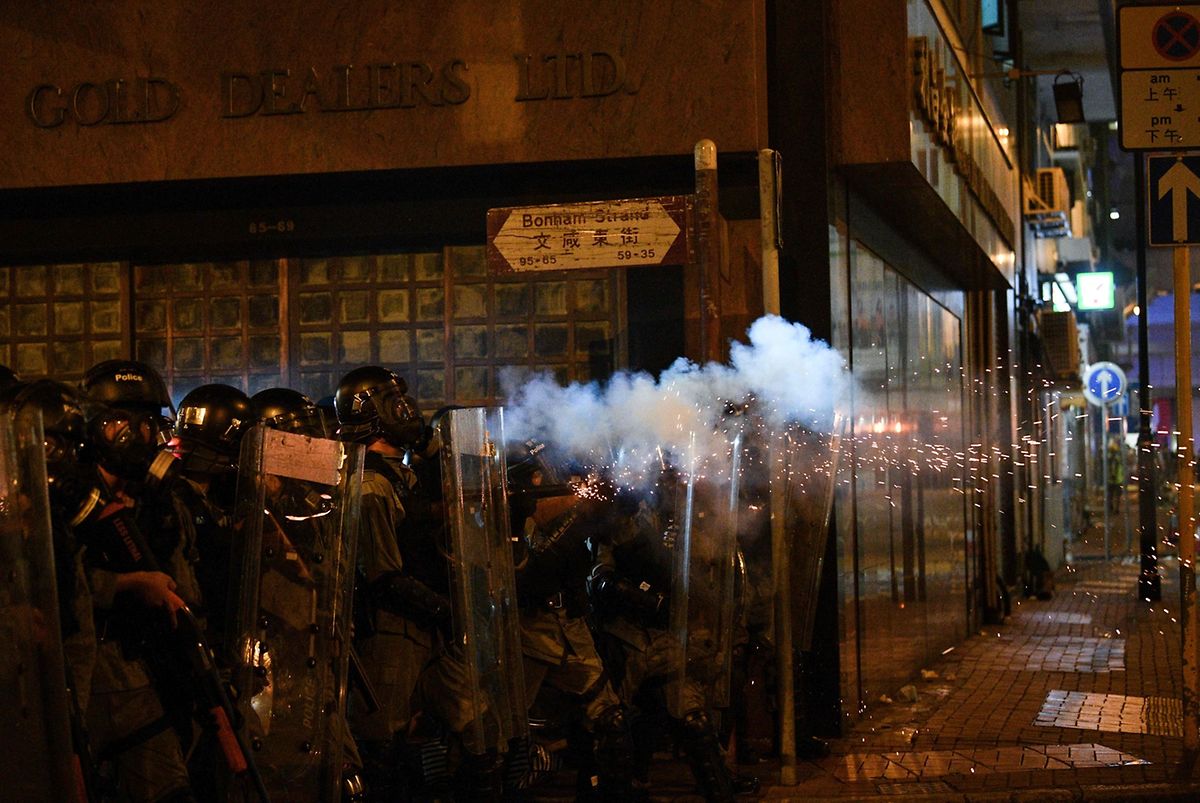 Police fire tear gas canisters towards protesters during a demonstration on July 28 Photo: AFP