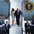 US President Donald Trump (R) and US First Lady Melania Trump (L) disembark Air Force One at Stansted Airport, north of London on July 12, 2018, as he begins his first visit to the UK as US president.
The four-day trip, which will include talks with Prime Minister Theresa May, tea with Queen Elizabeth II and a private weekend in Scotland, is set to be greeted by a leftist-organised mass protest in London on Friday. / AFP PHOTO / Brendan SMIALOWSKI