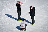 Members of Norway's ski jumping team react after the crash of Norway's Daniel Andre Tande during in the FIS Ski Jumping World Cup Flying Hill Individual competition in Planica on March 25, 2021. (Photo by Jure Makovec / AFP)