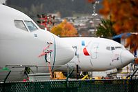 (FILES) In this file photo taken on November 10, 2020 Boeing 737 MAX airliners with American Airlines markings are pictured on the ramp at Renton Airport adjacent to the Boeing Renton Factory in Renton, Washington. - US prosecutors hit Boeing with a $2.5 billion fine to settle charges the company defrauded regulators over the 737 MAX, the Justice Department announced January 7, 2021. (Photo by Jason Redmond / AFP)