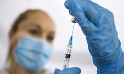 A health worker prepares a dose of Chinese-made Sinopharm Covid-19 vaccine in Belgrade Fair turned into a vaccination centre, on February 12, 2021. - Inside the dome of Belgrade's fairgrounds, dozens of nurses in protective suits inject Covid-19 jabs into young and old alike, working with an efficiency that has turned Serbia into continental Europe's fastest vaccinator.
The small Balkan country has inoculated more than 500,000 of its seven million population in almost two weeks, a rate that exceeds all countries in Europe outside the United Kingdom, according to the scientific publication Our World in Data. (Photo by Andrej ISAKOVIC / AFP)