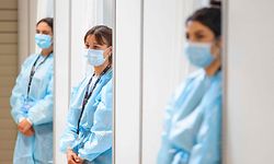 Health workers wait prior to administer Moderna vaccines against the Covid-19 at a newly-opened vaccination center in Lausanne, on April 19, 2021. - Switzerland significantly eased its Covid-19 restrictions despite acknowledging that the country's virus situation "remains fragile" and has even worsened recently. (Photo by Valentin FLAURAUD / AFP)